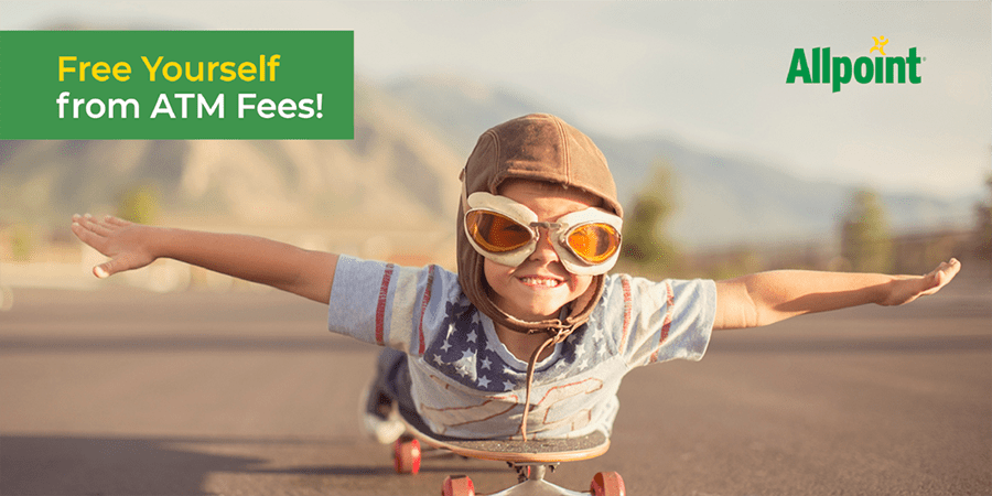 A young boy laying on a skateboard with outstretched arms and wearing goggles. At the top left, the words: free yourself from ATM fees!