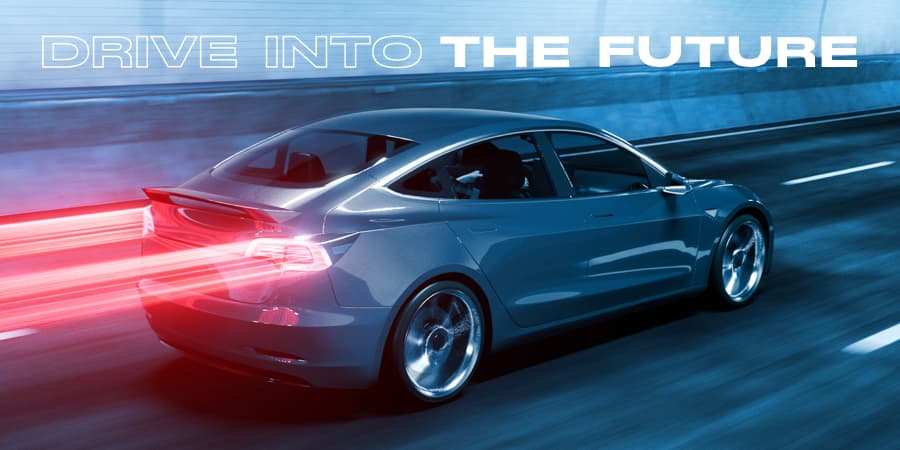 A Tesla speeding through a tunnel highway. At the top, the words: drive into the future.