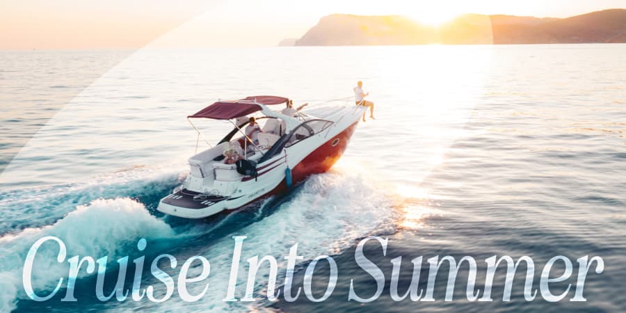 An arial view of an open fisherman boat on the ocean. At the bottom, the words: cruise into summer.