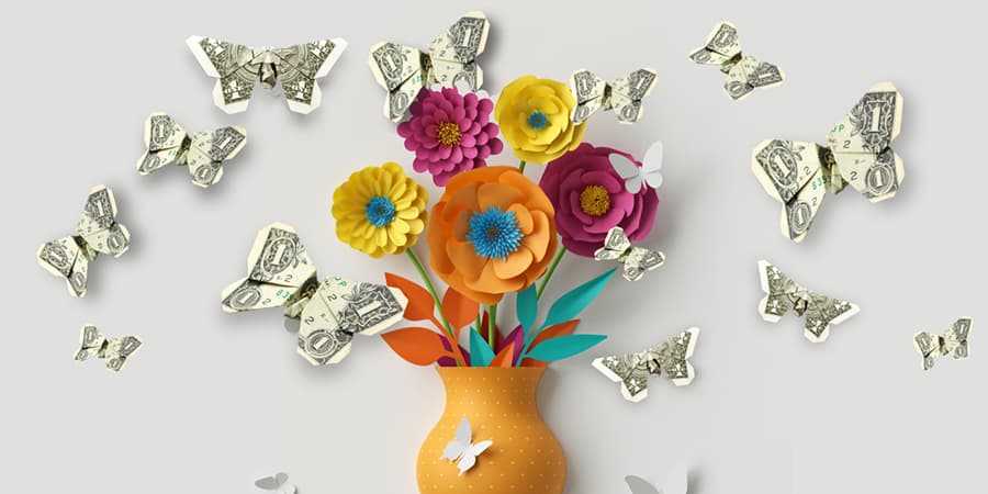 An illustration of a colorful flower arrangement surrounded by dollar bills.