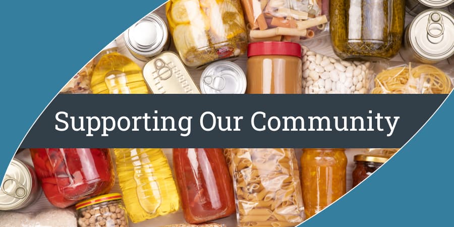 Top view of perishable items. Across the center, the words: supporting our community.