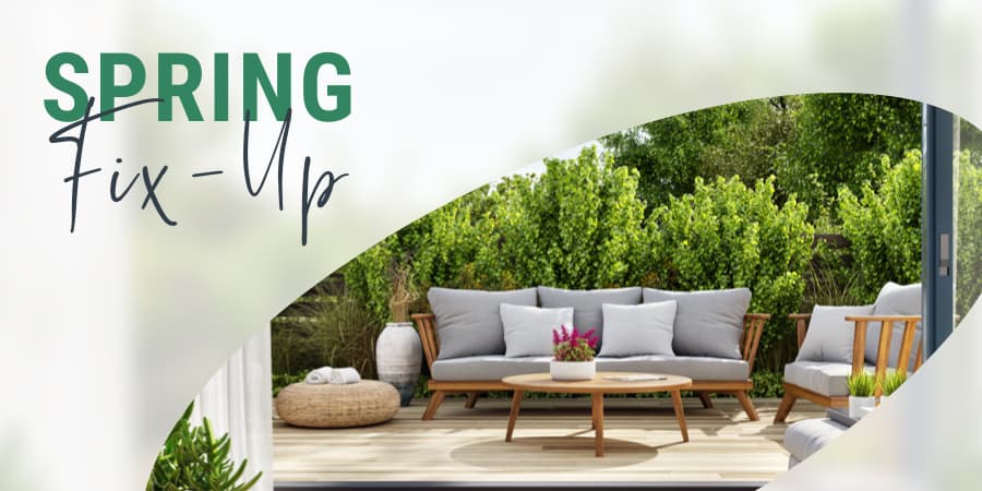An outdoor patio with modern furniture. To the left, the words: spring fix-up.