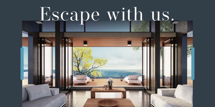 A living room view of a modern home overlooking the beautiful ocean. At the top, the words: escape with us.