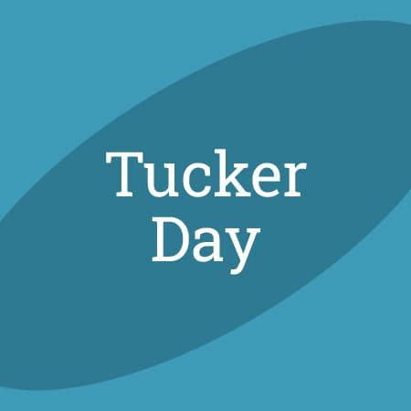 The words: Tucker Day against a blue background.