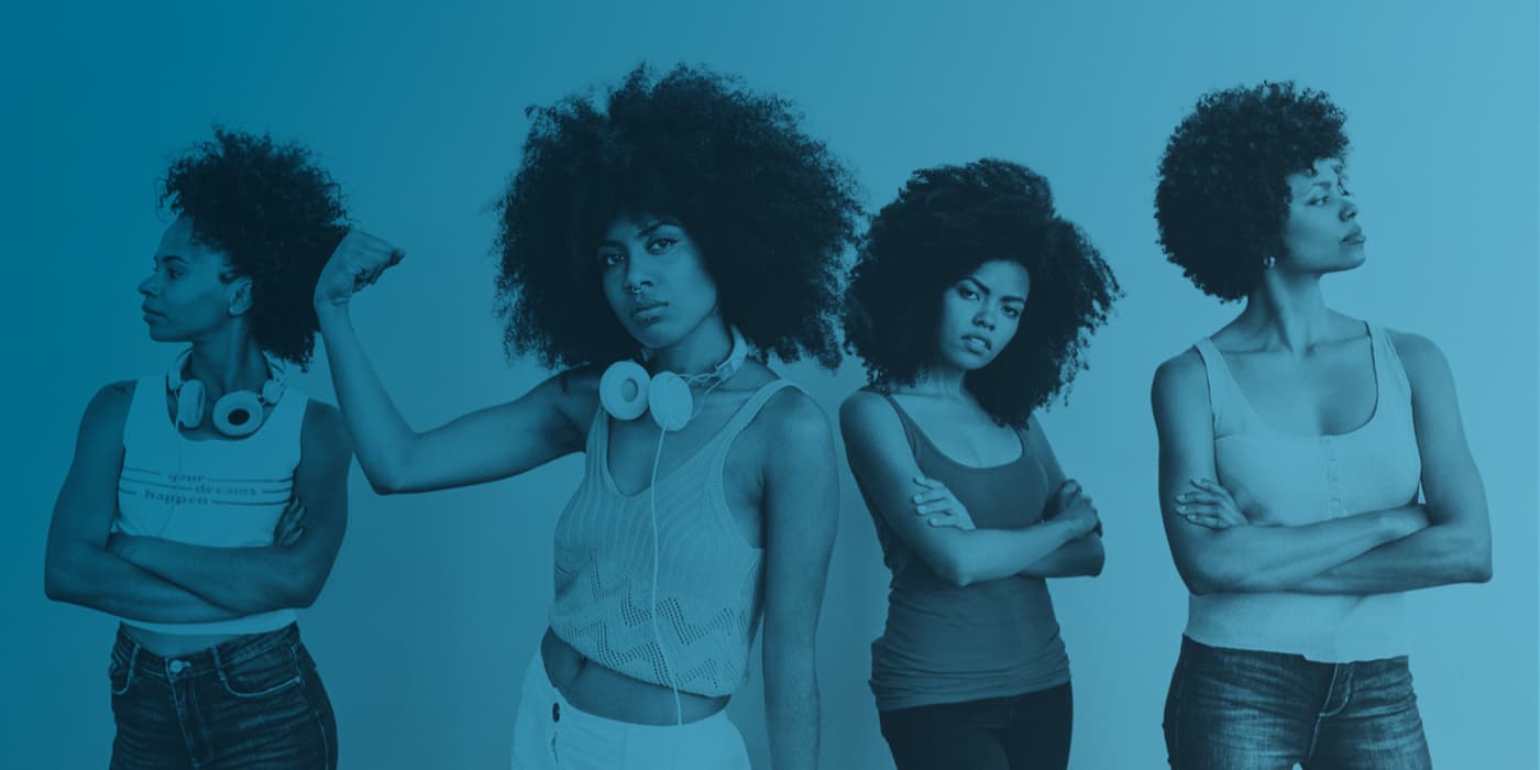 A group of woman posing with expressions of empowerment.